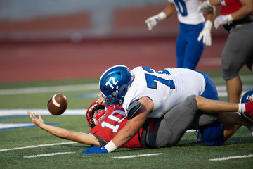 Great action photos of high school football players making amazing plays during a football game