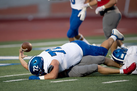 Great action photos of high school football players making amazing plays during a football game