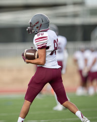 Great action photos of high school football players making amazing plays during a football game