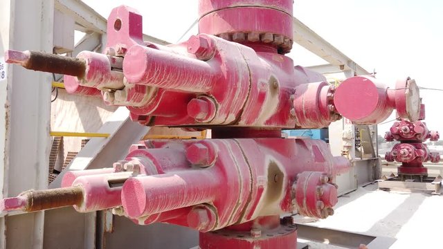 Old Blow Out Preventer (BOP) laying on the shipyard in the desert