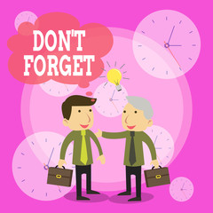Conceptual hand writing showing Don T Forget. Concept meaning Know by Heart Think Back Fix in the Mind Refresh Memory Businessmen Colleagues with Brief Case Sharing Idea Solution