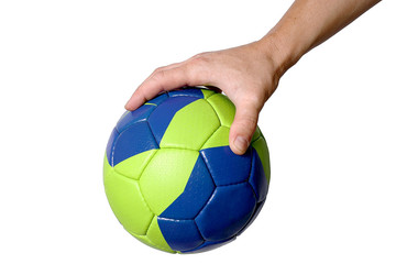 Handball ball in hand closeup on a white background
