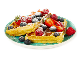 waffles with berries isolated on white