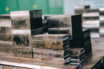 pieces of metal of different thickness