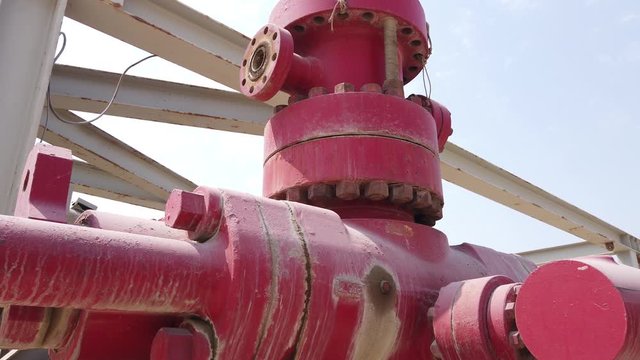 Old Blow Out Preventer (BOP) laying on the shipyard in the desert