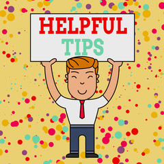 Writing note showing Helpful Tips. Business concept for Ask an Expert Solutions Hints Consulting Warning Smiling Man Standing Holding Big Empty Placard Overhead with Both Hands