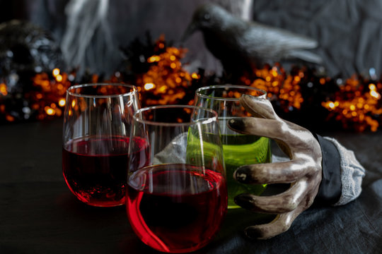 Halloween drinks with haunted hand