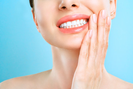 Tooth Pain And Dentistry. Young Woman Suffering From Strong Teeth Pain, Touching Cheek With Hand. Female Feeling Painful Toothache. Dentistry Care Concept