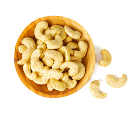 cashew nuts in a bowl isolated on white background