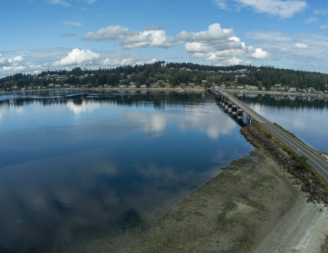 Outstanding aerial photography of the picturesque Fox Island Bridge connection Gig Harbor and Fox Island in the state of Washington.
