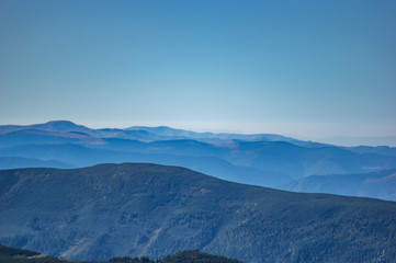 Fototapeta na wymiar Mountains in the blue haze