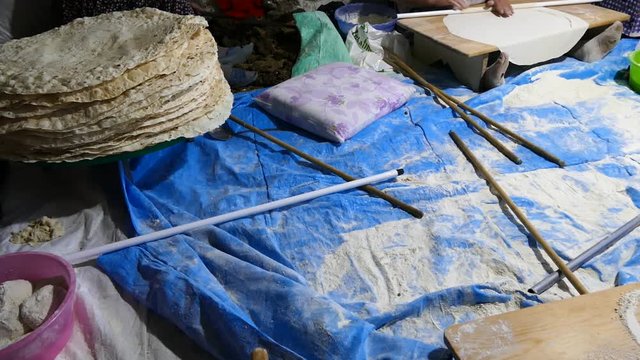 village women making yufka bread in tandoor, yufka bread in central Anatolia,