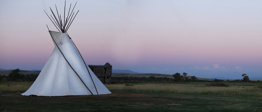 White High Plains Tee Pee At Sunset