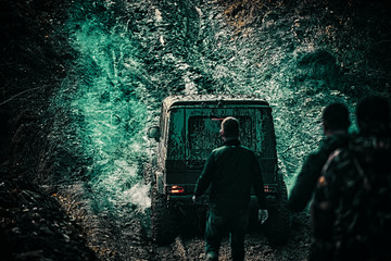 Drag racing car burns rubber. Best Off Road Vehicles. Extreme. Off-road car. Expedition offroader. Mud and water splash in off the road racing. © Volodymyr