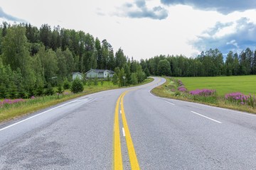 Fototapeta premium Fields, lakes of finland. Panoramic field landscape. Beautiful nature background.