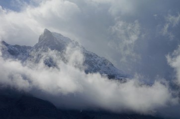 Fototapeta na wymiar Majestic foggy mountains of the Canadian Rockies