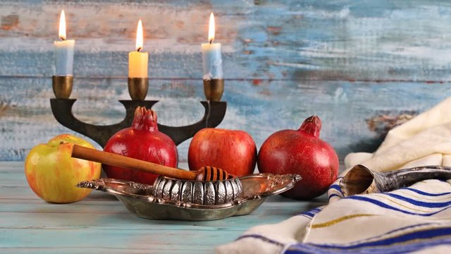 Jewish Holiday Rosh hashanah honey and apples with pomegranate traditional symbols