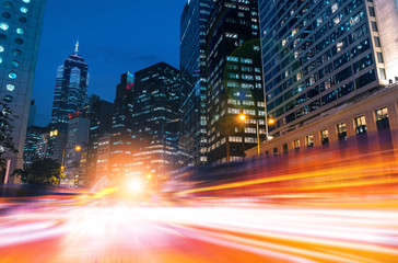 Obraz premium Busy traffic and urban landscape at night in Hong Kong