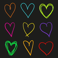 Multicolored hearts on isolated black background. Set of stylish signs. Unique sketchy elements for your design