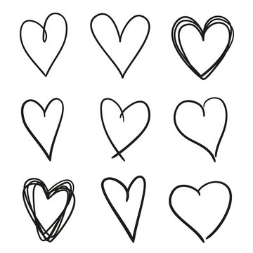Hand drawn grunge hearts on isolated white background. Set of love signs. Unique image for design. Black and white illustration