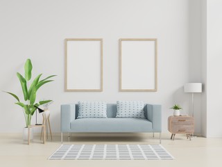Interior poster mockup with vertical empty wooden frame standing on wooden floor with sofa and cabinet.