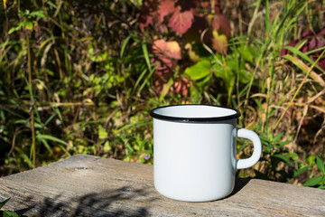 White campfire enamel mug mockup with sun beams