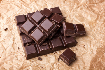 Chocolate on paper background