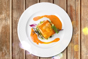 Grilled Salmon Steak  with Spinach, Tartare Cream and Lemon Wedges