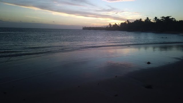 Calm sunset in slow motion on a beach in Samoa