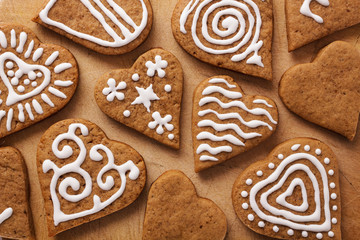 Heart of the cookie and wooden background.