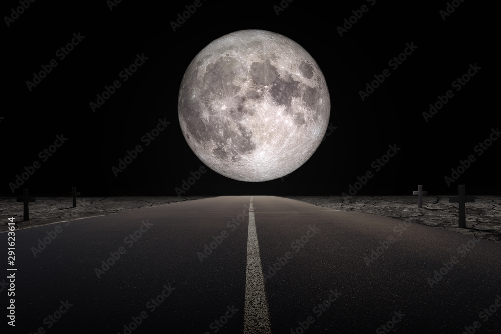 Wall mural halloween concept : empty road leading to full moon flanked with tomb in dark night. (elements of th