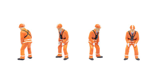 Group of Miniature figurine character as railway shunter standing and posing in posture isolated on...