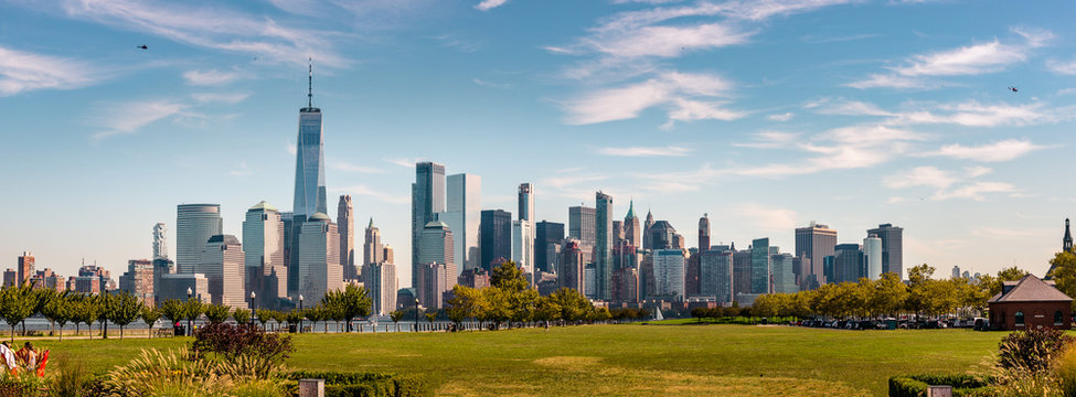 New York Skyline Showing Several Prominent Buildings And Hotels Under A Blue Sky.