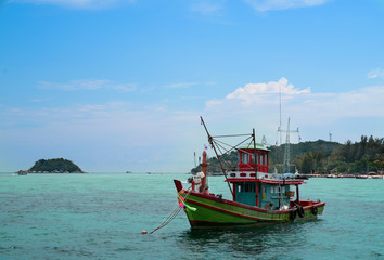 Fishing boat in sea with bluesky