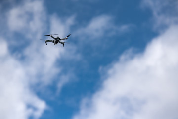 Fototapeta na wymiar surveillance drone flying in the sky