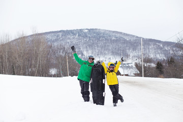 kids having fun in ski resort. children enjoy sledding on the mountain