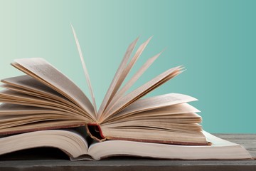 Books collection on dark background with copy space