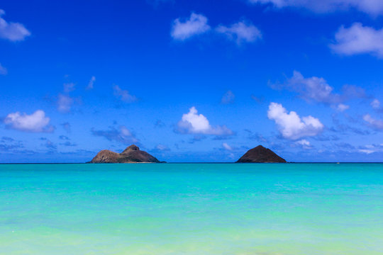 Beautiful view of the Lanikai Beach with the twin islands of Na Mokulua off shore in Haiwaii
