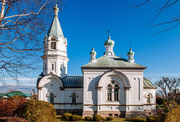 Fototapeta premium Hakodate Orthodox Church - Russian Orthodox church in winter under blue sky