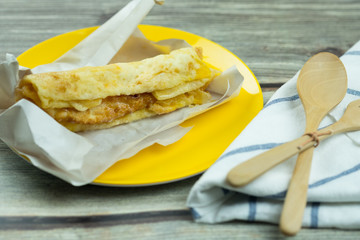 Deep fried of crispy Roti with sweetened condensed milk, egg and sugar