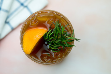 Orange juice espresso with ice. Ice cold summer drink.