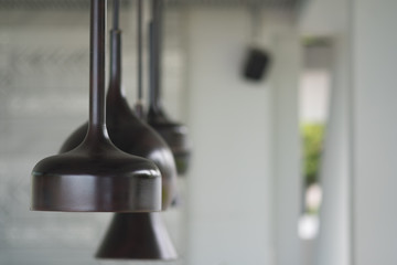 Black decorative lamp hanging from the ceiling