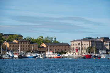 Fototapeta na wymiar Morning autumn view over islands, boats and piers in Stockholm