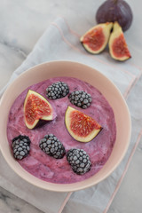 healthy yogurt with fresh figs on a table