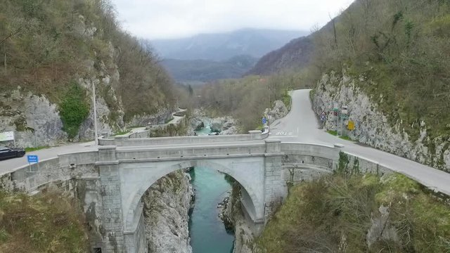 Flying under the bridge on Soca river. Slovenia