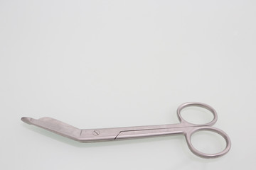 Guaze cutting scissors on copy space