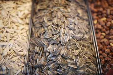 Salted and dried seeds on the counter in the market