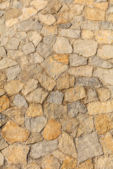 Wall of stone blocks as an abstract background