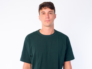 Fototapeta premium Portrait of young handsome man looking at camera