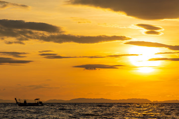 Fototapeta na wymiar Stunning sunrise on the way to Maya Bay, on the Thai island of Koh Phi Phi Leh